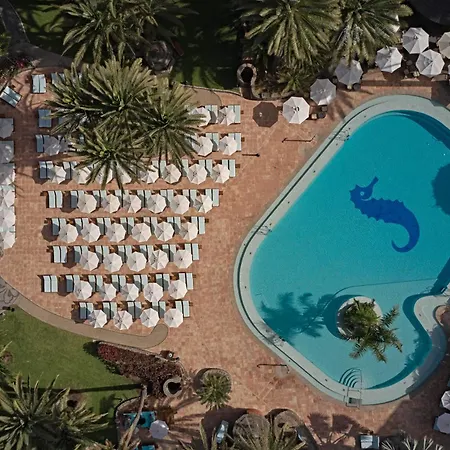Отель Seaside Palm 5*