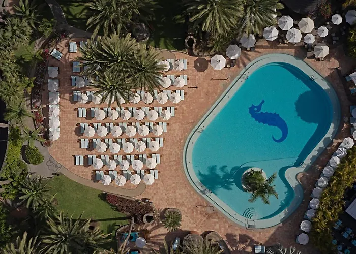 Отель Seaside Palm 5*