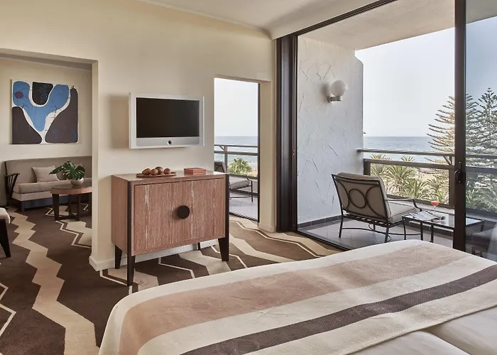 Отель Seaside Palm 5*